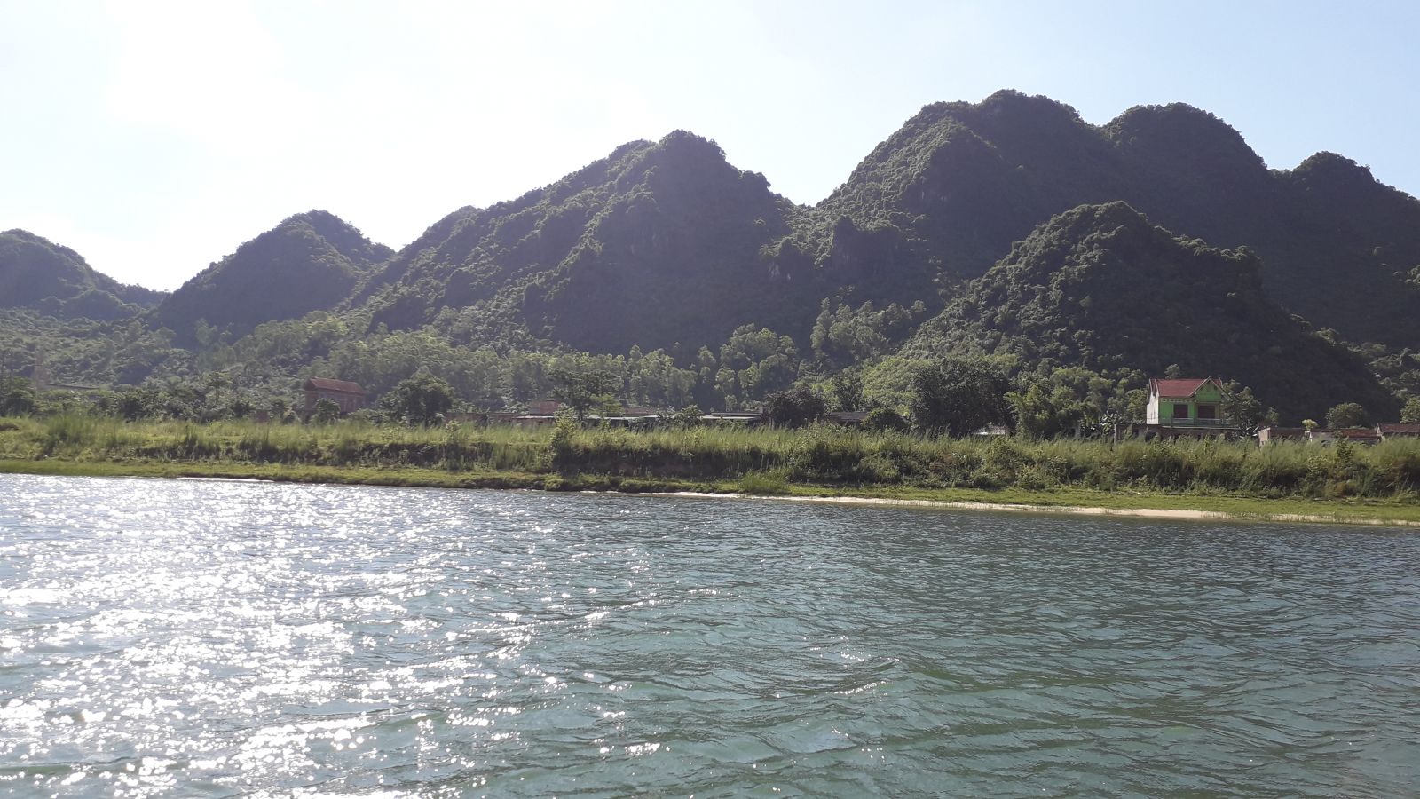 Do a scenic boat ride on Son river to visit Phong Nha & Tien Son cave